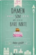 Forside af bogen Damen som købte en bus og bare kørte